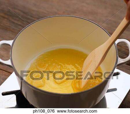 Garlic slices in oil View Large Photo Image Stock Photograph - Garlic slices in oil. Fotosearch