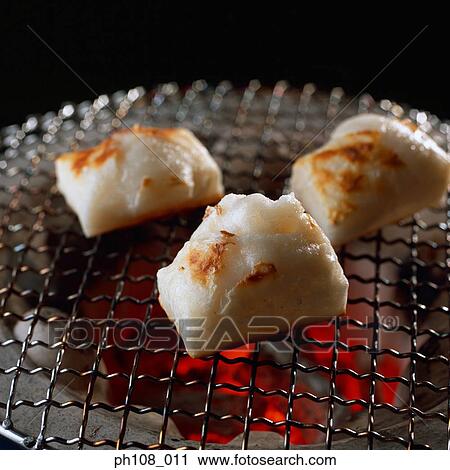 Grilled fishcakes over charcoal fire View Large Photo Image Stock Image - Grilled fishcakes over charcoal fire. Fotosearch