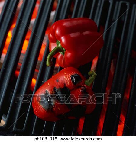 Grilled red peppers over charcoal fire View Large Photo Image Stock Photography - Grilled red peppers over charcoal fire. Fotosearch