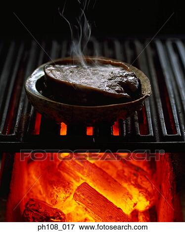 Meat over charcoal fire View Large Photo Image Stock Photo - Meat over charcoal fire. Fotosearch