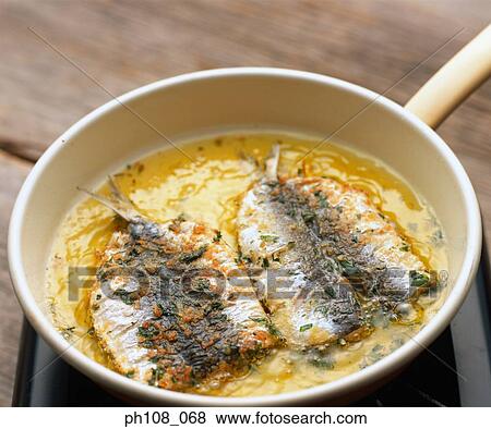 Pan fried fish View Large Photo Image Stock Photo - Pan fried fish. Fotosearch