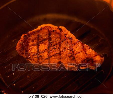 Pan-fried pork chop View Large Photo Image Stock Photograph - Pan-fried pork chop. Fotosearch