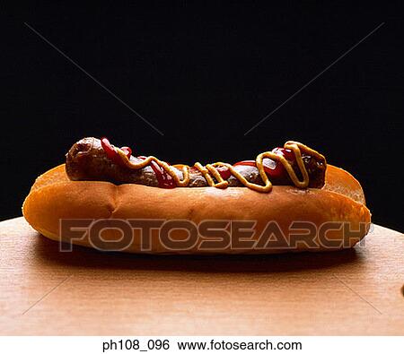 Sausage bun with tomato and custard sauce View Large Photo Image Stock Photograph - Sausage bun with tomato and custard sauce. Fotosearch