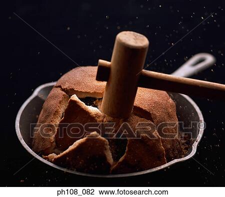 Smashing crust with hammer View Large Photo Image Stock Image - Smashing crust with hammer. Fotosearch