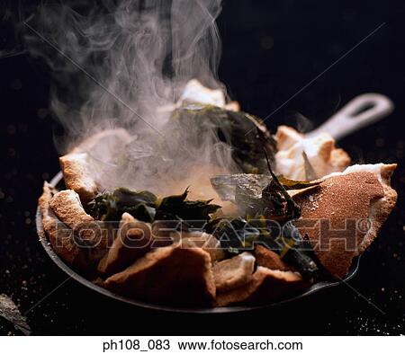 Steaming hot from inside the hard crust View Large Photo Image Stock Image - Steaming hot from inside the hard crust. Fotosearch