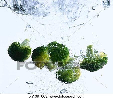 Broccoli pieces in boiling water View Large Photo Image Stock Image - Broccoli pieces in boiling water. Fotosearch