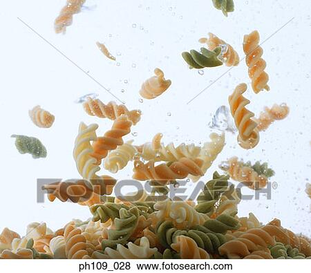 Corkscrew pasta in boiling water View Large Photo Image Stock Photo - Corkscrew pasta in boiling water. Fotosearch