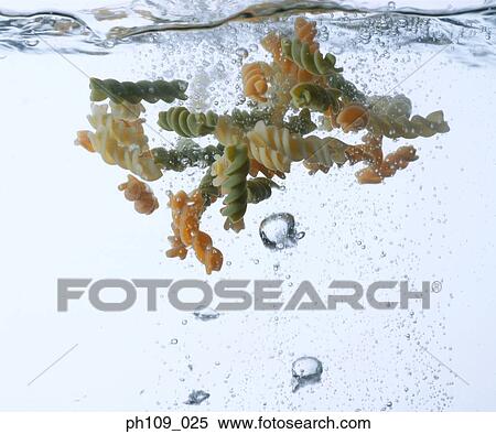 Corkscrew pasta in boiling water View Large Photo Image Stock Photography - Corkscrew pasta in boiling water. Fotosearch