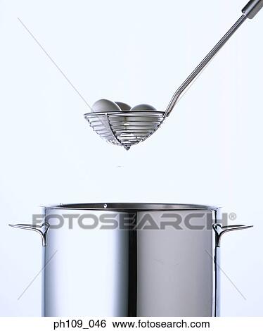 Eggs in colander, draining water View Large Photo Image Stock Photograph - Eggs in colander, draining water. Fotosearch