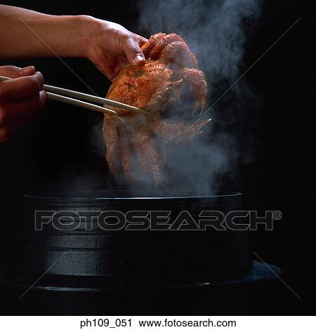 Taking whole crab from Pot View Large Photo Image Stock Image - Taking whole crab from Pot . Fotosearch