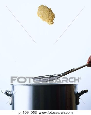Tossing noodles in midair View Large Photo Image Stock Image - Tossing noodles in midair. Fotosearch