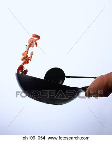 Tossing prawns with wok View Large Photo Image Picture - Tossing prawns with wok. Fotosearch