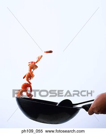 Tossing prawns with wok View Large Photo Image Stock Photography - Tossing prawns with wok. Fotosearch