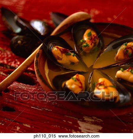 Stock Photography - Bowl of mussel soup. Fotosearch