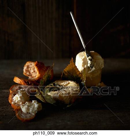 Cheese on French loaf slices View Large Photo Image Stock Photo - Cheese on French loaf slices. Fotosearch