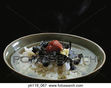 Stock Photo - A bowl of rice soup. Fotosearch