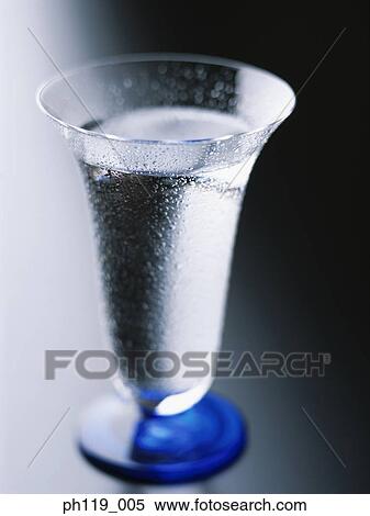 A glass of cold water, close-up View Large Photo Image Stock Photography - A glass of cold water, close-up. Fotosearch