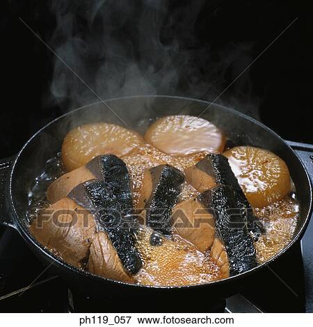 Stock Photo - A hot pot of mixed food. Fotosearch