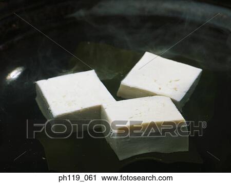 Cooking bean curds in soup View Large Photo Image Stock Image - Cooking bean curds in soup. Fotosearch