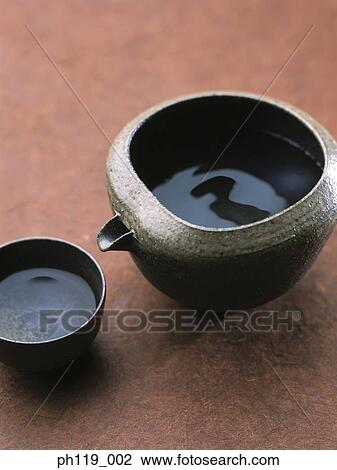 Japanese tea pot and a cup of tea View Large Photo Image Stock Image - Japanese tea pot and a cup of tea. Fotosearch