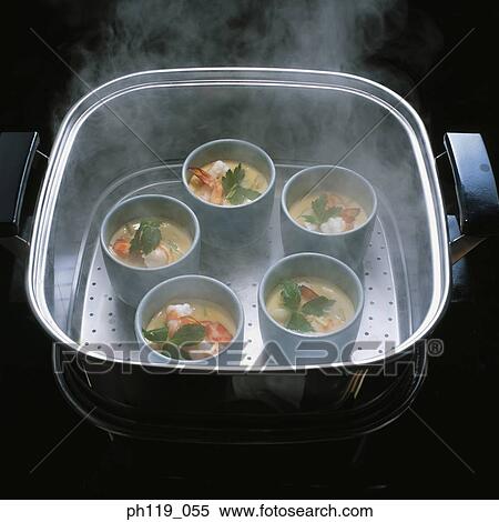 Steaming bowls of seafood soup View Large Photo Image Stock Photography - Steaming bowls of seafood soup. Fotosearch