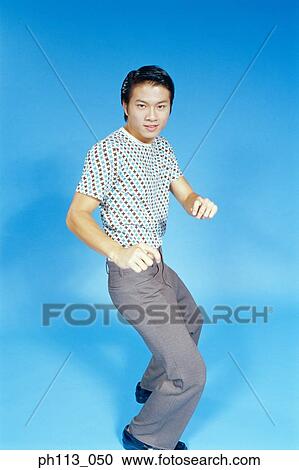 Man in polka dot shirt, posing View Large Photo Image Stock Image - Man in polka dot shirt, posing. Fotosearch
