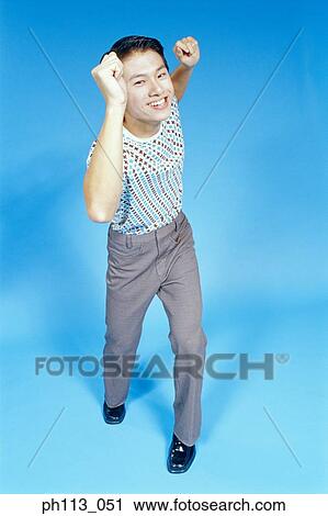 Man in polka dot shirt, posing View Large Photo Image Stock Image - Man in polka dot shirt, posing. Fotosearch