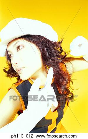 Stock Image - Woman in retro dress dancing, close-up. Fotosearch