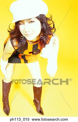 Woman in retro dress dancing, close-up View Large Photo Image Stock Photography - Woman in retro dress dancing, close-up. Fotosearch