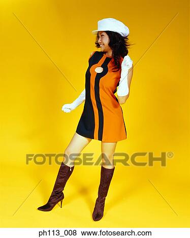 Stock Photo - Woman in retro dress dancing. Fotosearch