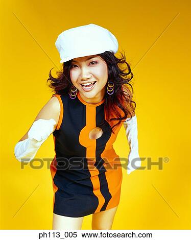 Woman in retro dress dancing View Large Photo Image Stock Photography - Woman in retro dress dancing. Fotosearch