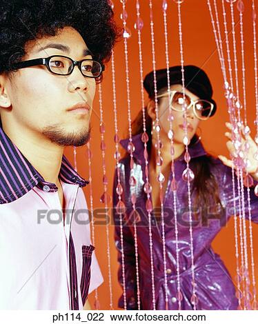Portrait of a retro couple View Large Photo Image Stock Image - Portrait of a retro couple. Fotosearch