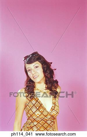 Portrait of a young woman posing View Large Photo Image Stock Image - Portrait of a young woman posing. Fotosearch