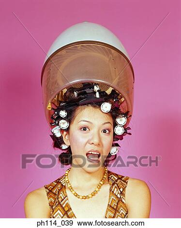 Woman with curlers View Large Photo Image Stock Photo - Woman with curlers. Fotosearch