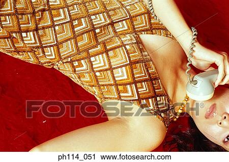 Young woman on the phone, midsection View Large Photo Image Stock Image - Young woman on the phone, midsection. Fotosearch