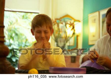 Father and son blowing balloons View Large Photo Image Stock Photography - Father and son blowing balloons. Fotosearch