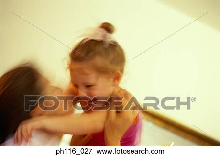 Mother carrying daughter, laughing View Large Photo Image Stock Photo - Mother carrying daughter, laughing. Fotosearch