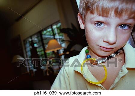 Stock Photo - Portrait of a young boy. Fotosearch