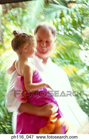 Stock Photo - Portrait of father and daughter. Fotosearch