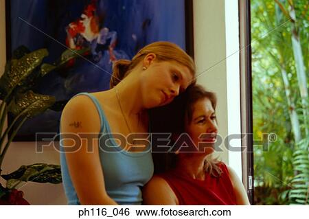 Portrait of mother and daughter View Large Photo Image Stock Photograph - Portrait of mother and daughter. Fotosearch