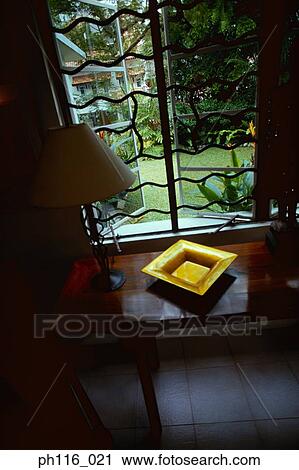 Side table by the window View Large Photo Image Stock Image - Side table by the window. Fotosearch