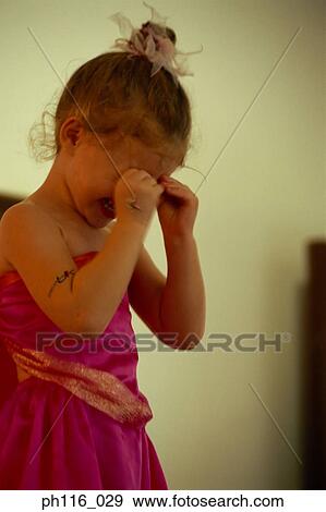 Young girl in pink costume, crying View Large Photo Image Stock Photo - Young girl in pink costume, crying. Fotosearch
