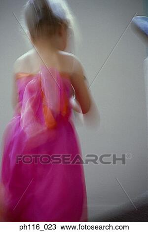 Young girl in pink costume, rear view View Large Photo Image Stock Image - Young girl in pink costume, rear view. Fotosearch
