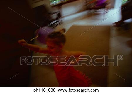 Young girl in pink costume, running in the house View Large Photo Image Stock Image - Young girl in pink costume, running in the house. Fotosearch