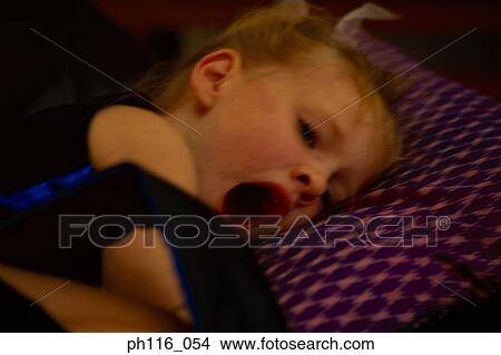 Young girl yawning View Large Photo Image Picture - Young girl yawning. Fotosearch