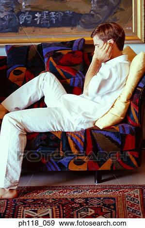 Portrait of a Caucasian man listening to music View Large Photo Image Stock Photo - Portrait of a Caucasian man listening to music. Fotosearch