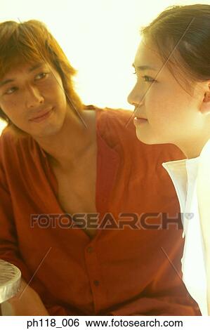 Portrait of a young couple View Large Photo Image Stock Photograph - Portrait of a young couple. Fotosearch