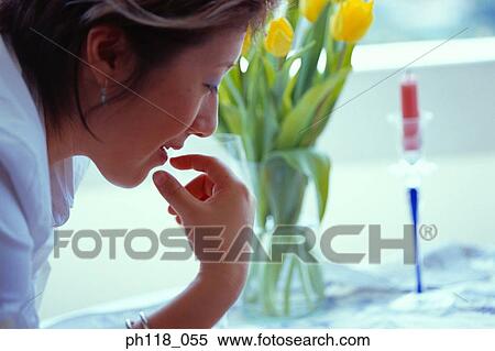 Stock Photography - Side profile of a young woman. Fotosearch