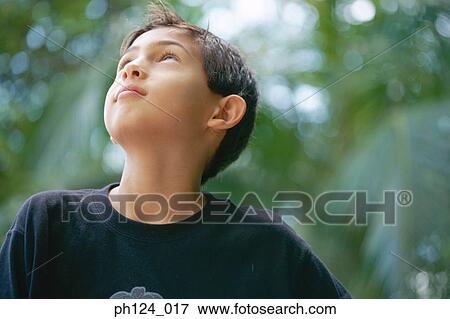 Stock Photo - Young Asian boy, portrait. Fotosearch