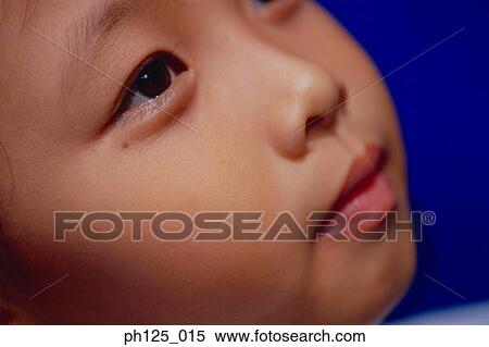 Stock Photography - Close-up of a young girl. Fotosearch
